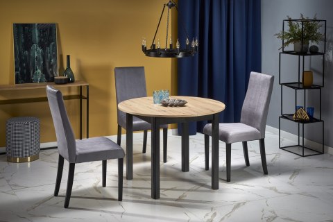 Halmar stół RINGO blat MDF okleinowany dąb artisan, nogi - czarny (102-142x102x76 cm) Halmar stół RINGO blat MDF okleinowany dąb artisan, nogi - czarny (102-142x102x76 cm)